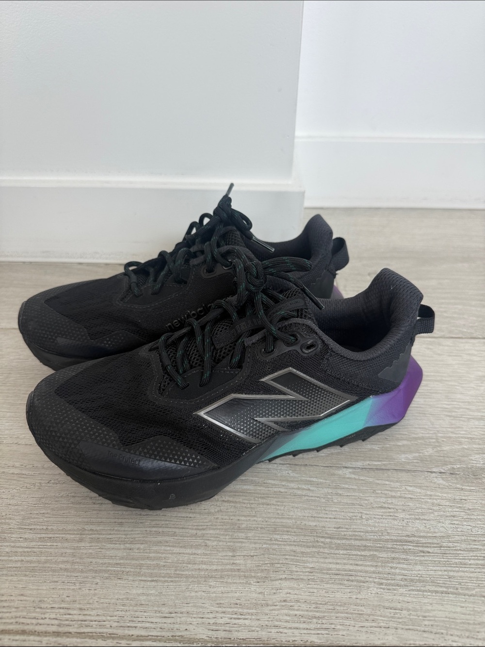 New Balance Black Sneakers with Teal and Purple Accent